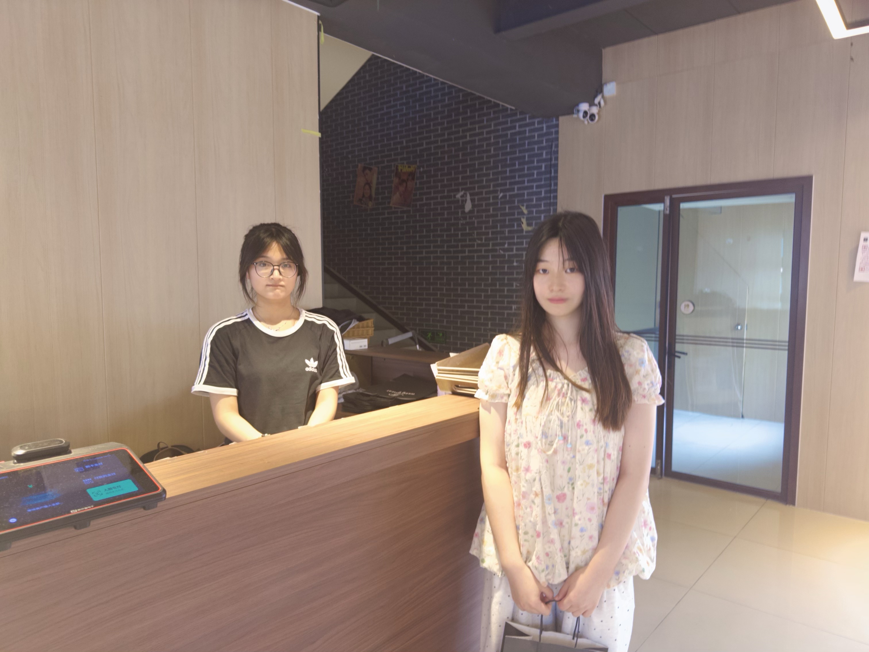 Warm Wheat team members standing at the bakery counter.