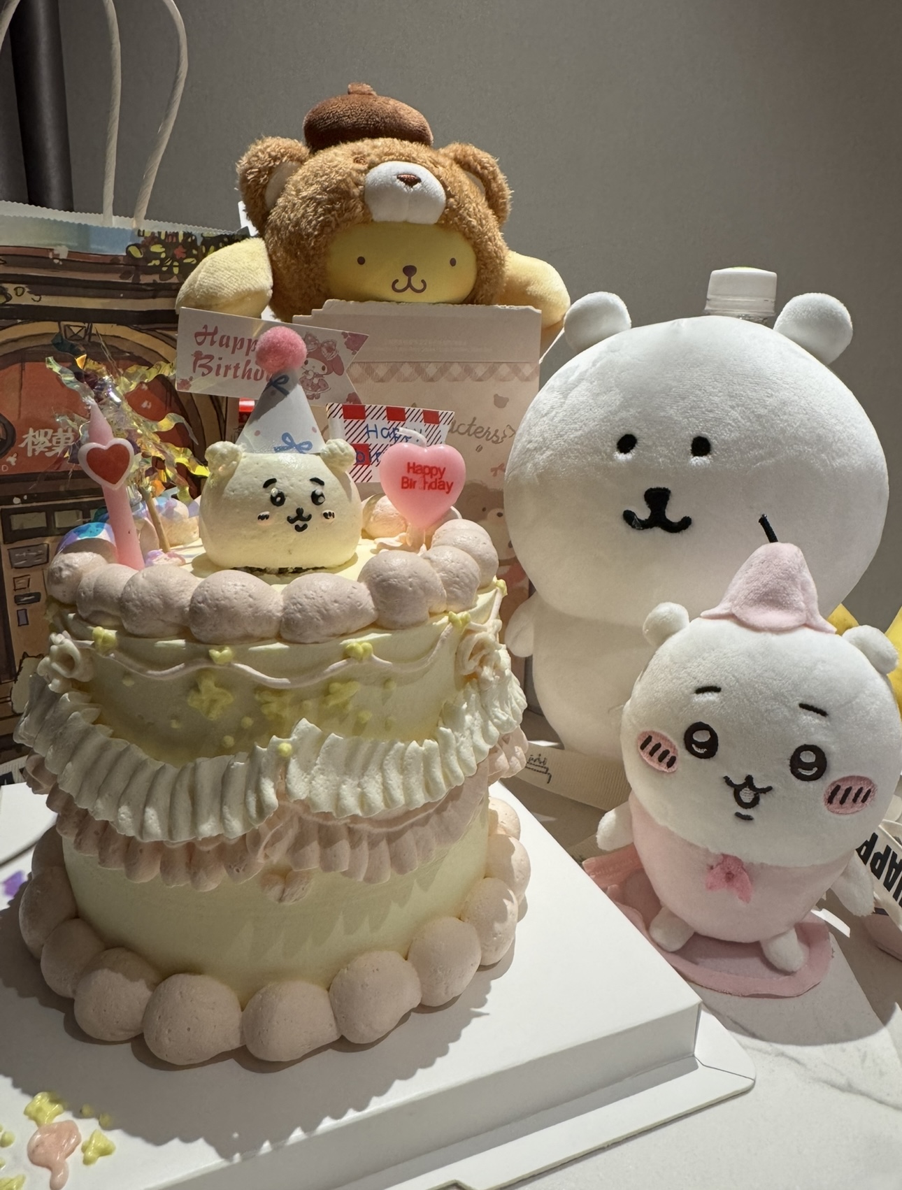 Cute cartoon shaped celebration cake with playful decorations.