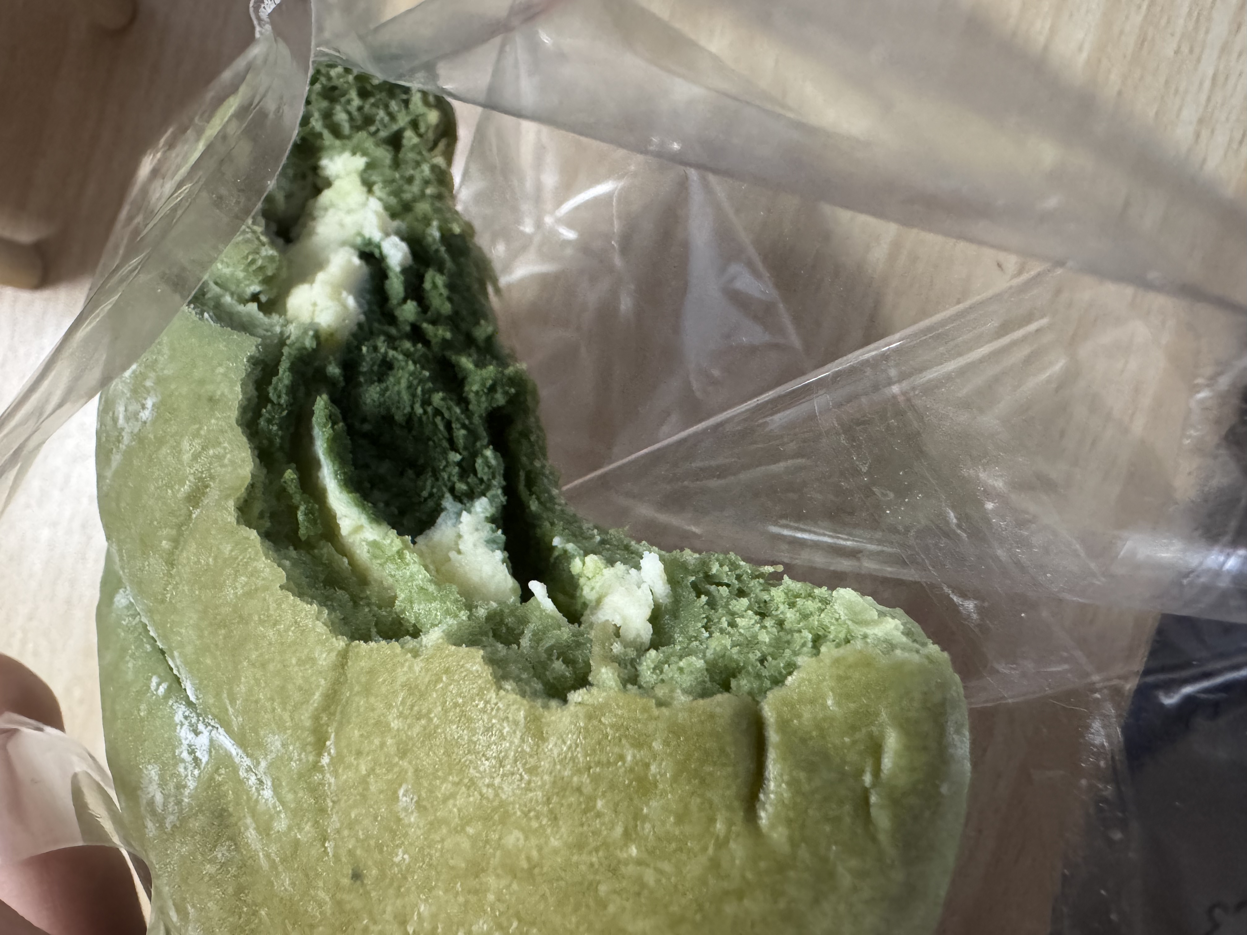 Matcha mochi bread with a visible mochi center.